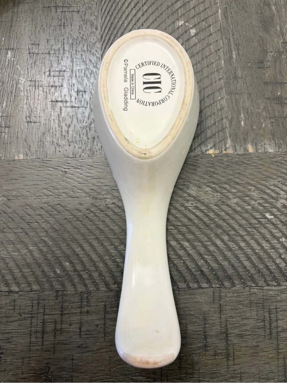 Pamela Gladding Cream Ceramic Spoon Rest with Pear and Floral Motif
